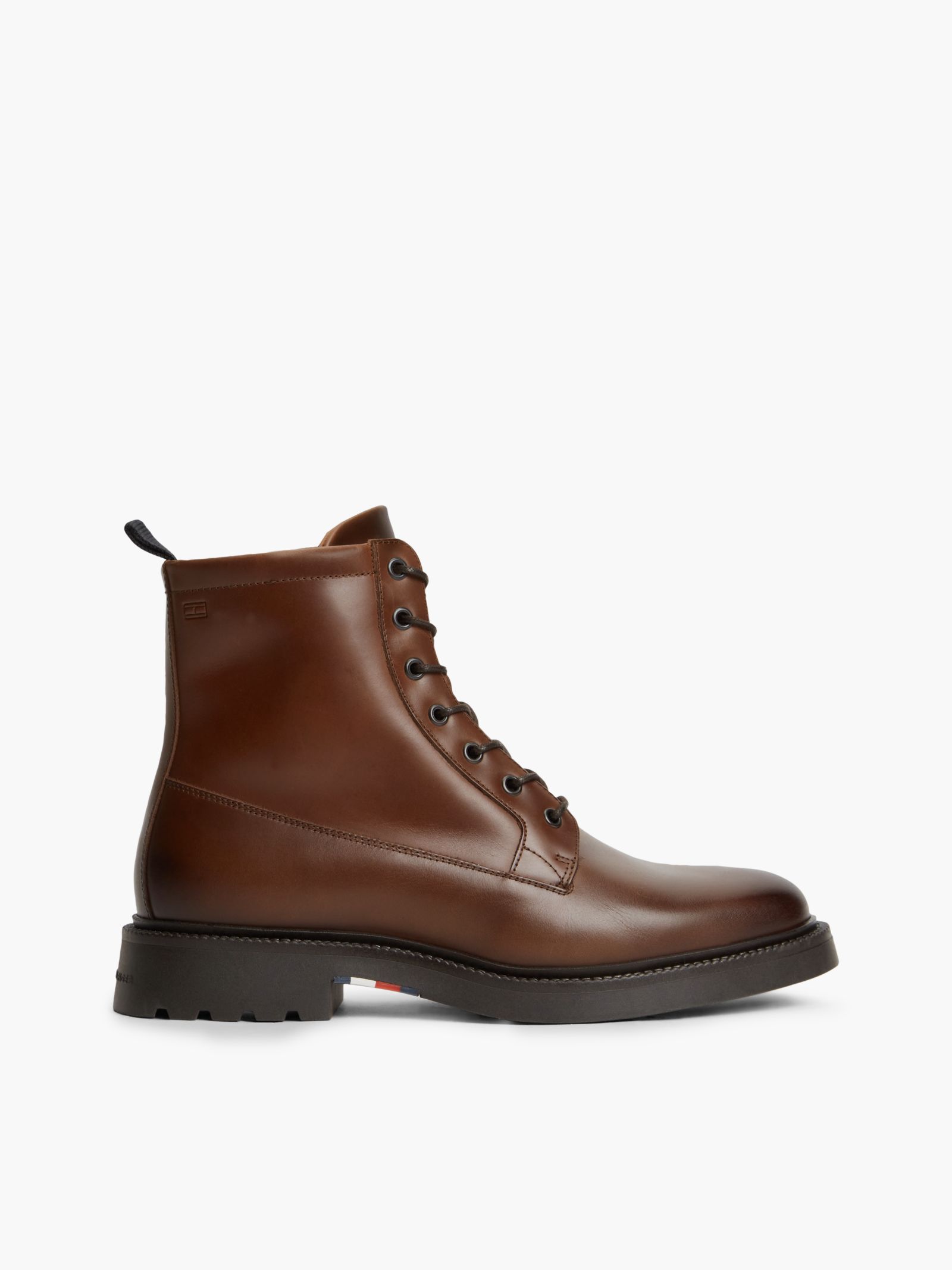 Tommy Hilfiger Leren halfhoge laars met profielzool en ritssluiting in bruin