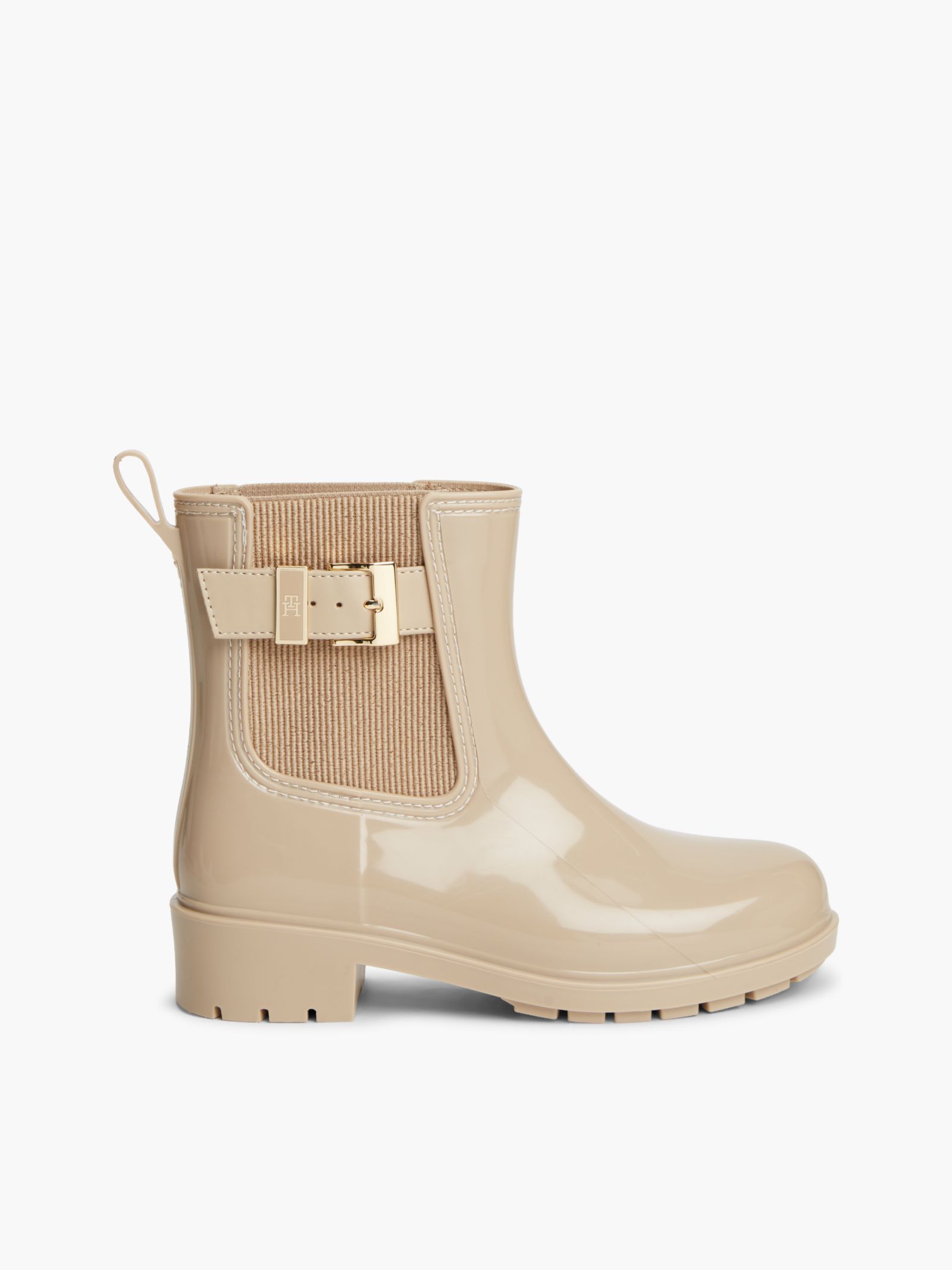 Tommy Hilfiger Regenlaars met profielzool gesp en glanzende finish in beige
