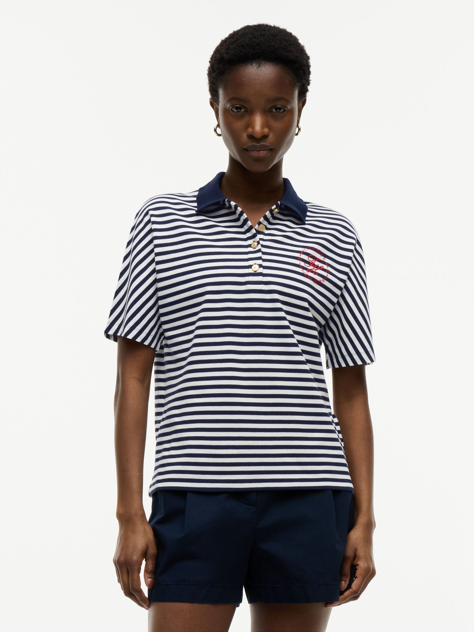 Tommy Hilfiger Regular fit poloshirt met goudkleurige knopen in marine