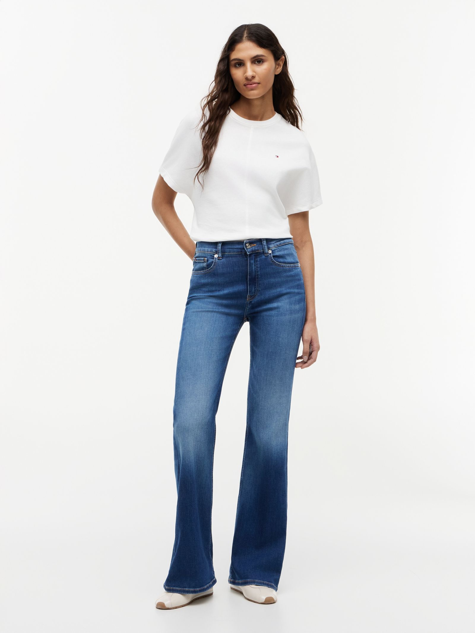 Tommy Hilfiger medium rise flared jeans met whiskers