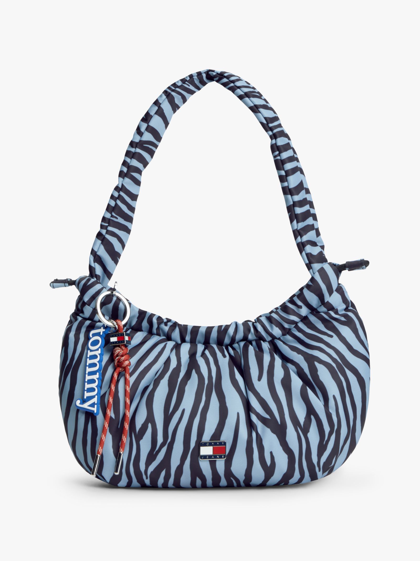 Tommy Jeans Schoudertas met zebraprint en bedels in blauw
