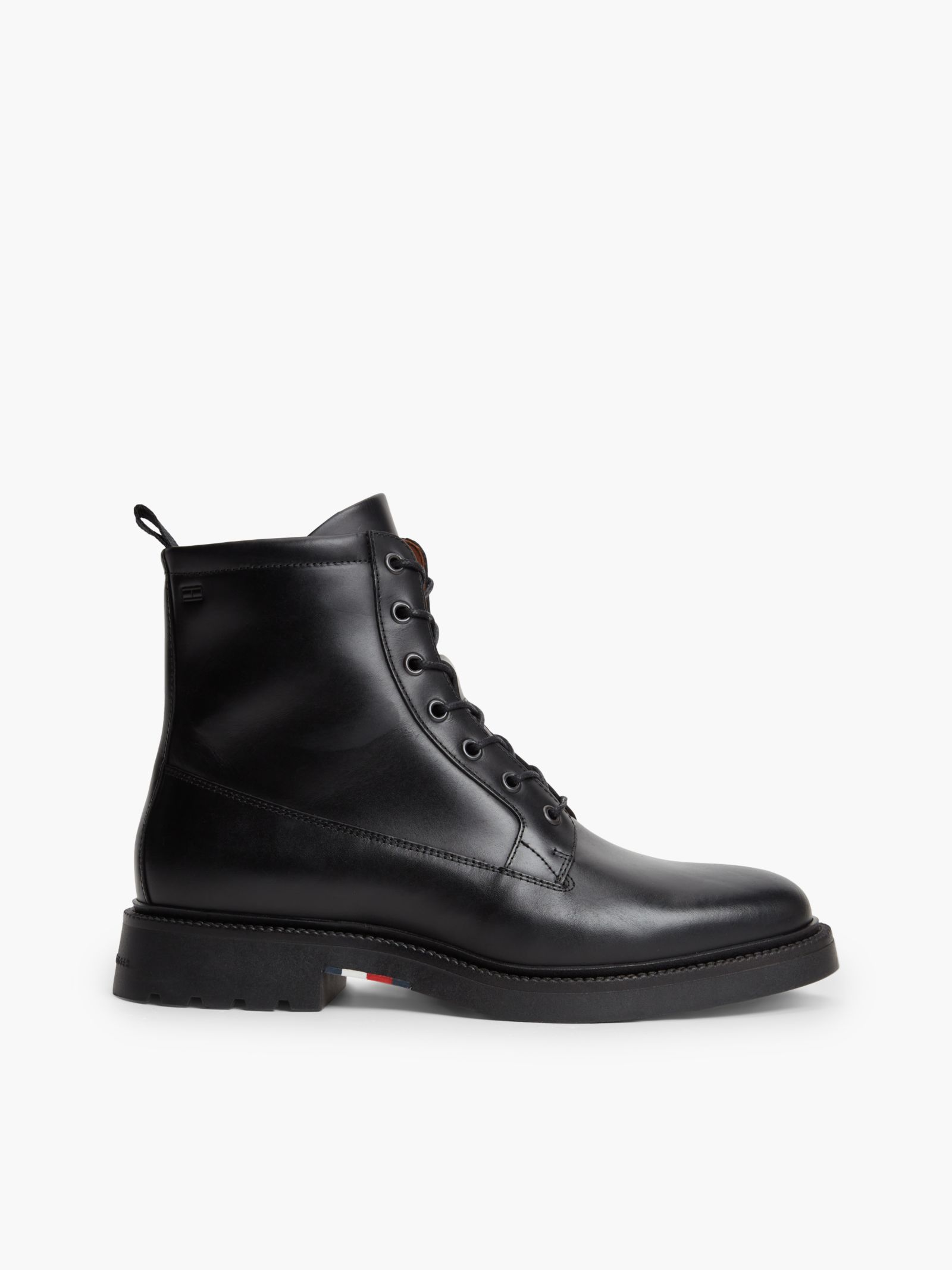 Tommy Hilfiger Leren halfhoge laars met profielzool en ritssluiting in zwart