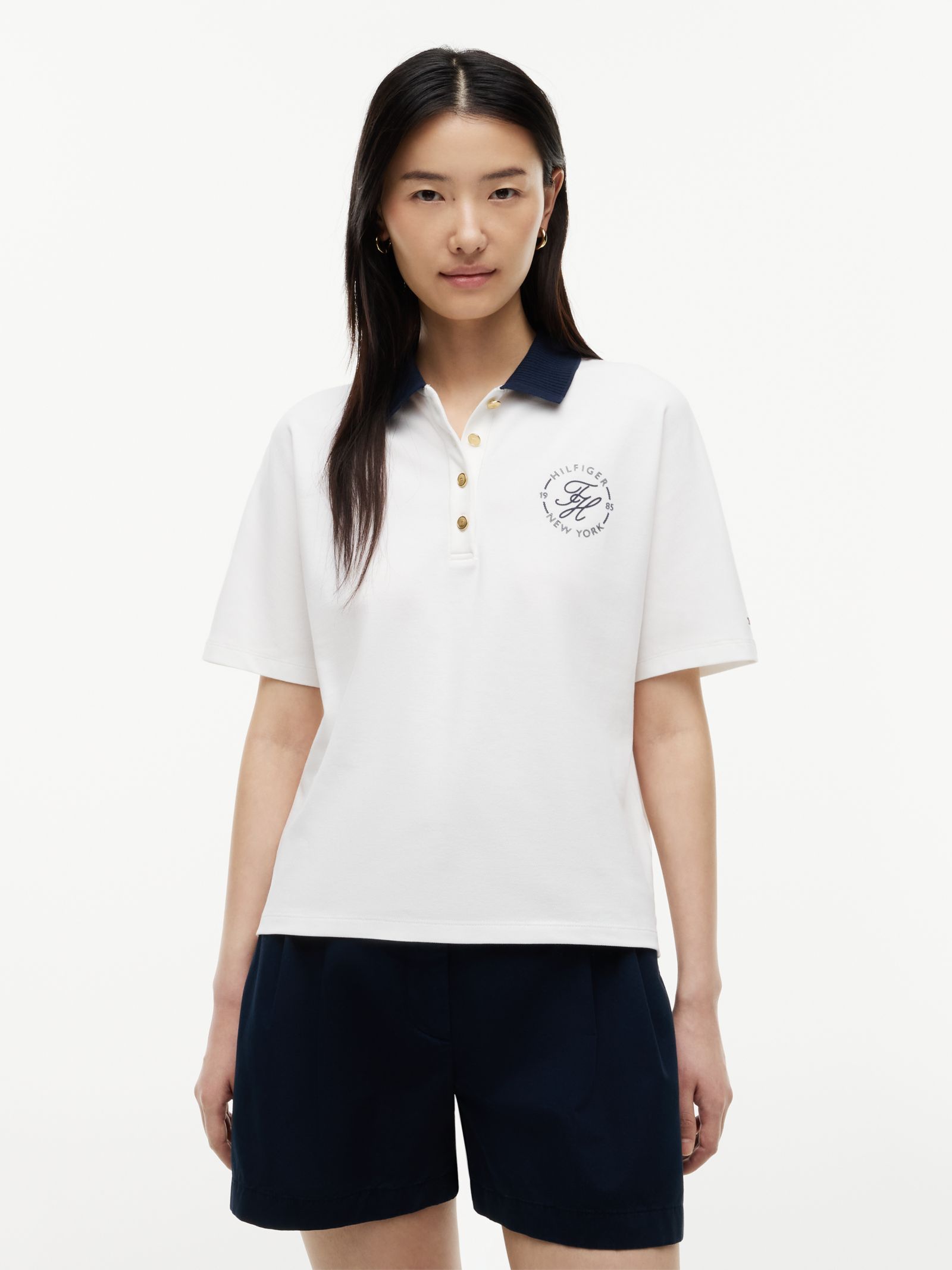 Tommy Hilfiger Regular fit poloshirt met goudkleurige knopen in wit