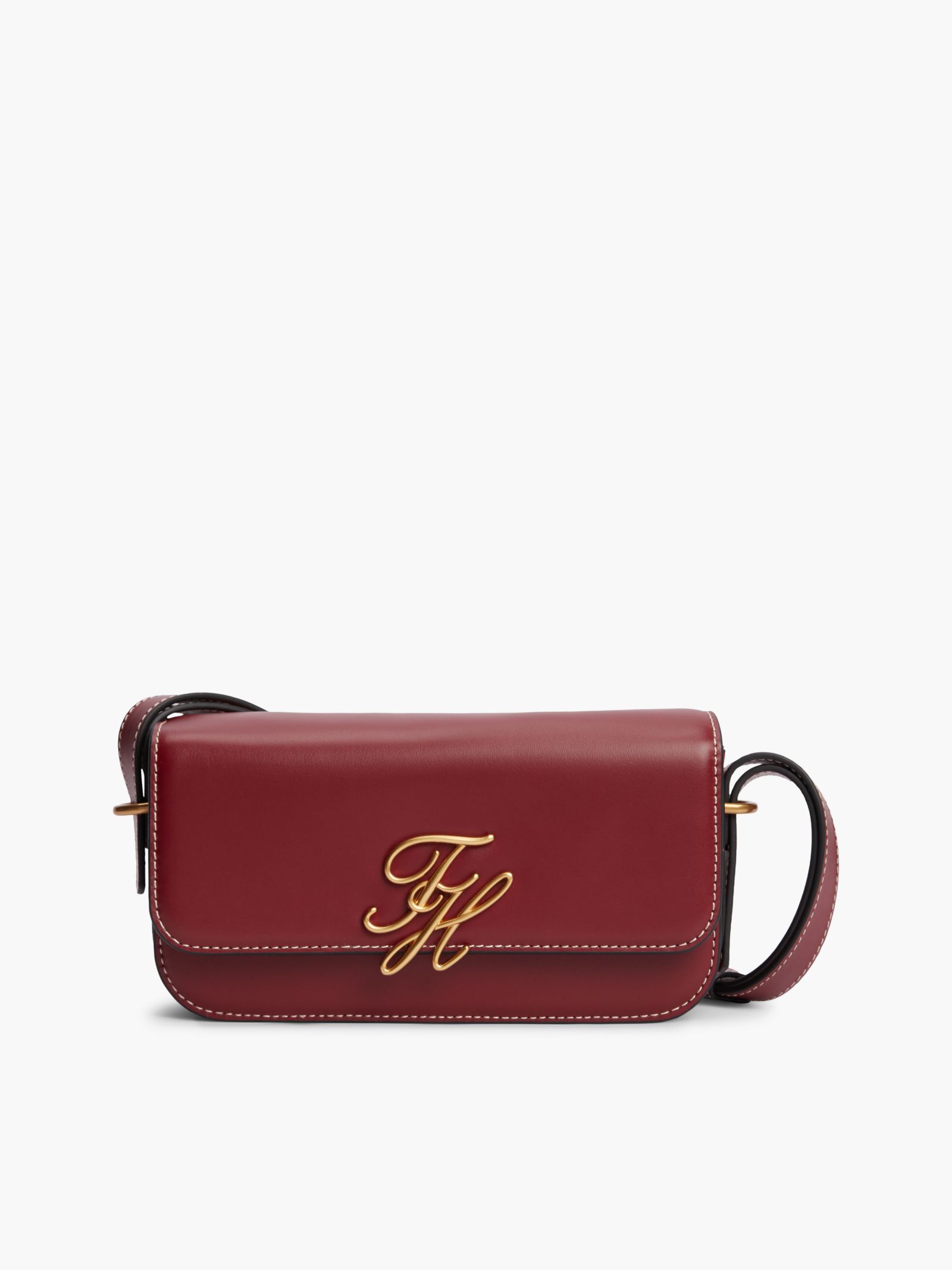 Tommy Hilfiger Leren crossbodytas met logo op de flap in rood