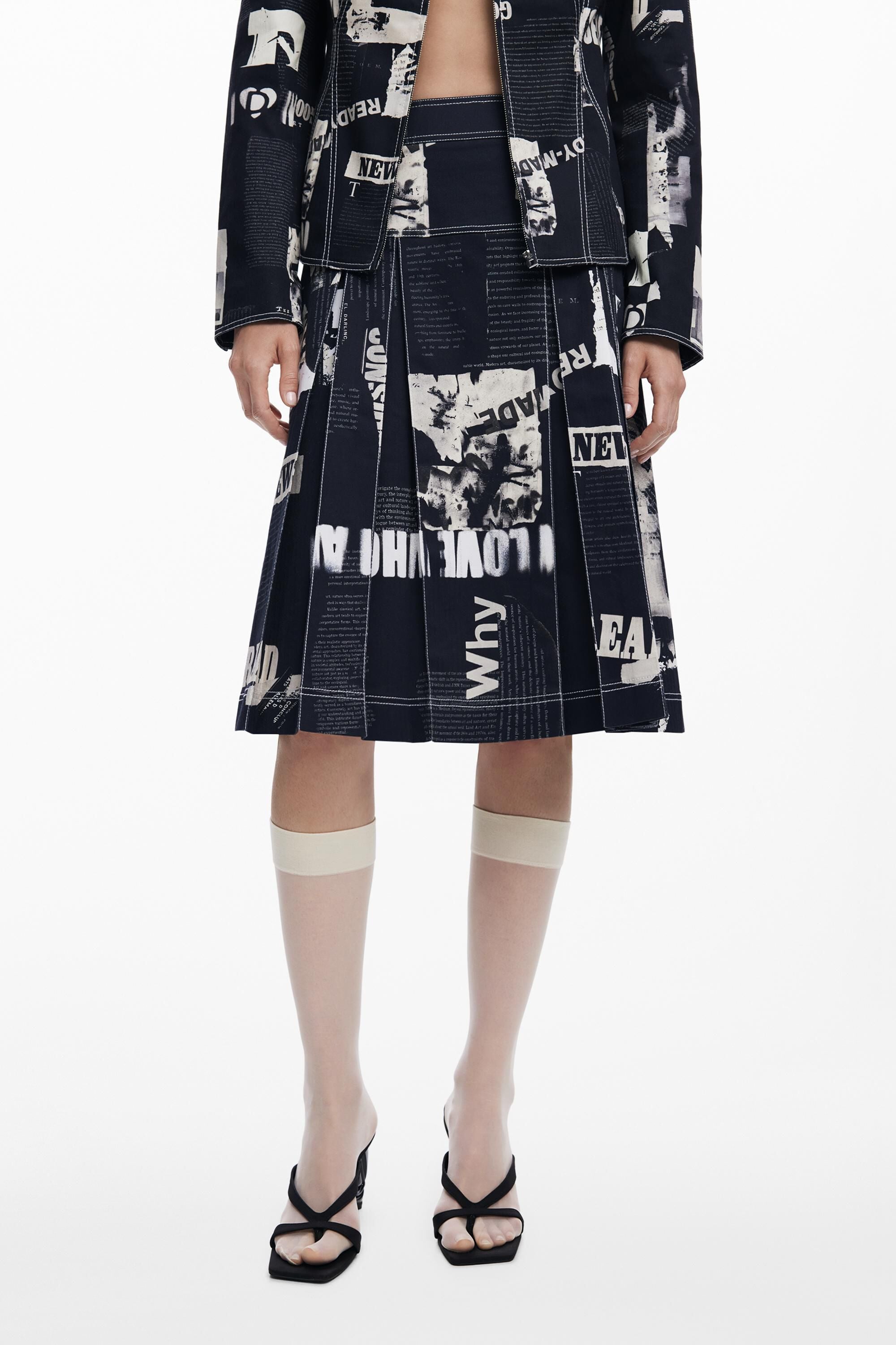 Desigual Midirok met plissé in krantenprint