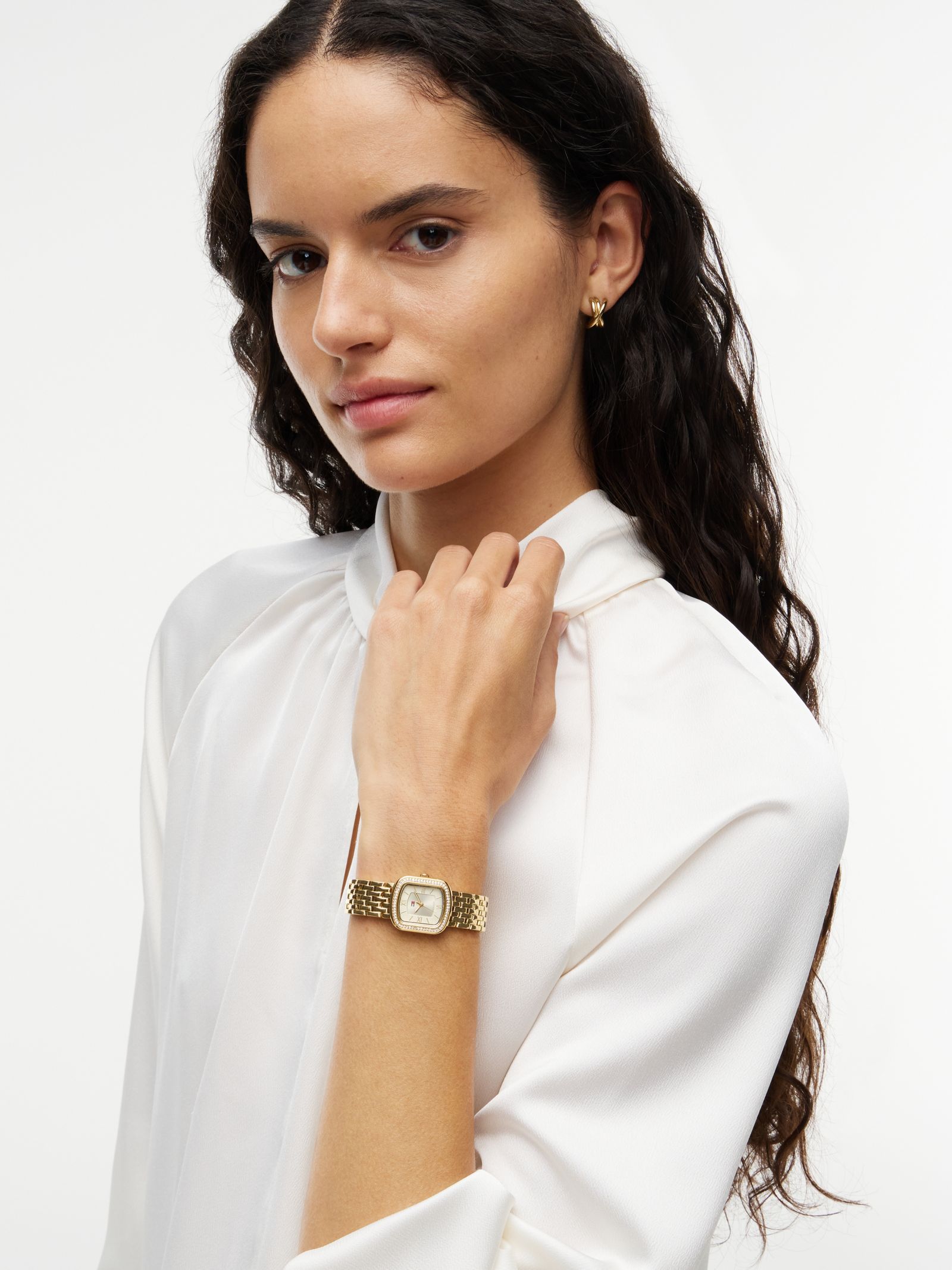 Tommy Hilfiger Verguld horloge met kristallen bezel en rechthoekige wijzerplaat